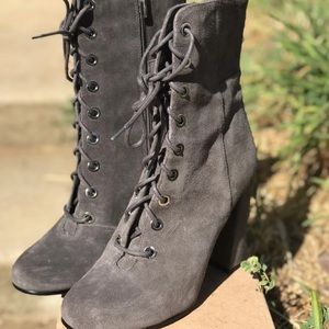 Grey heeled combat boots